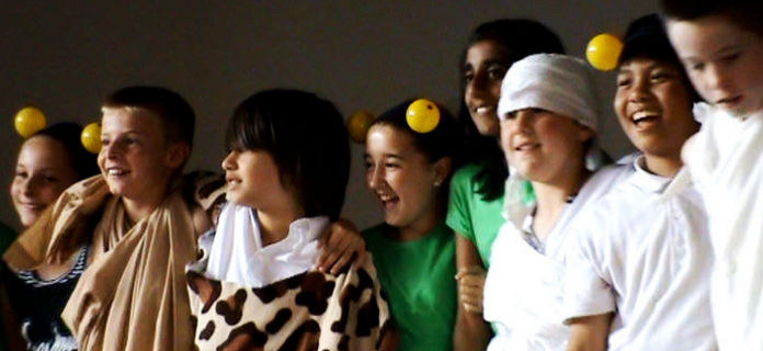 Students during performance of Frogs